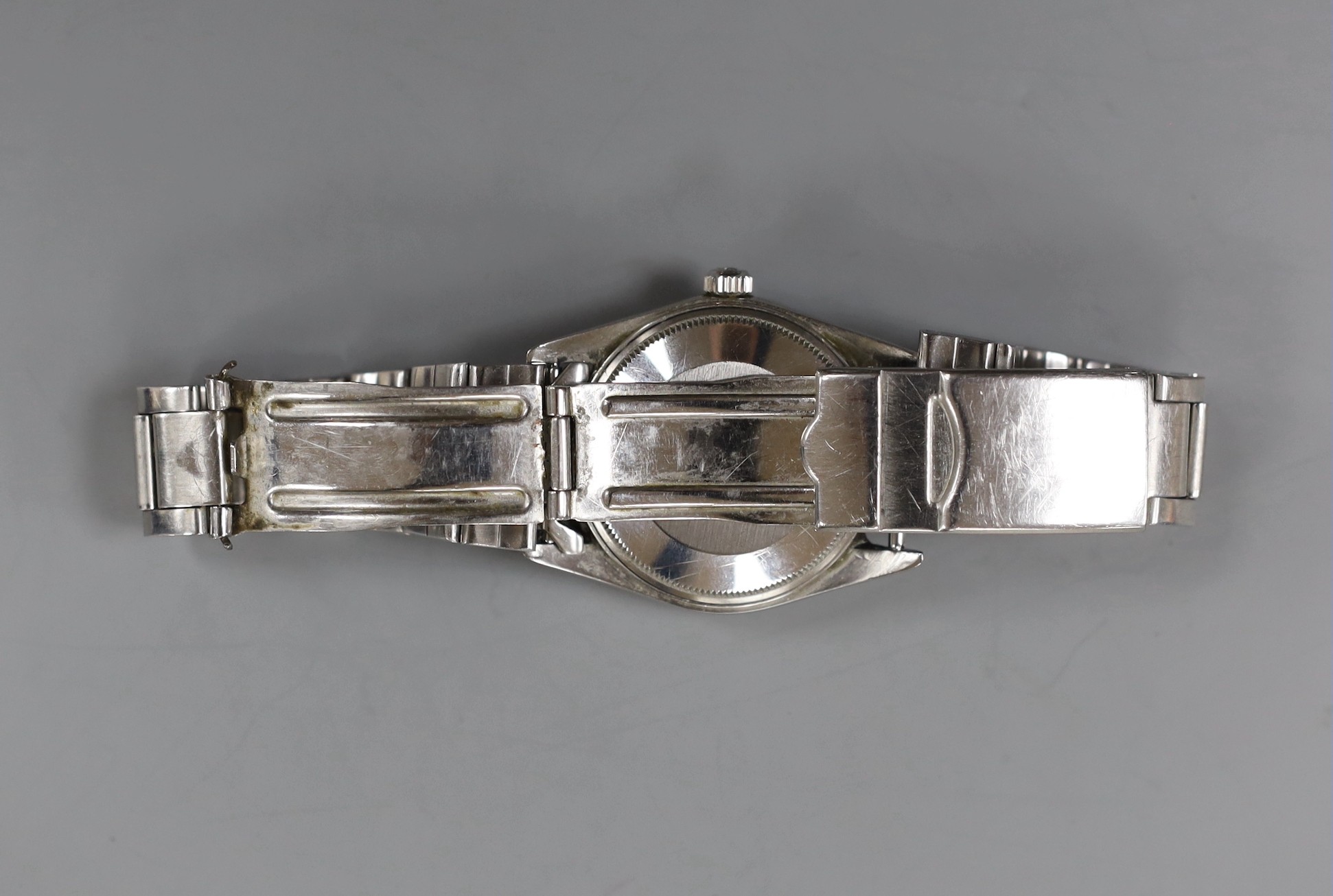 A gentleman's 1980's stainless steel Rolex Oyster Perpetual Date wrist watch, on an associated stainless steel bracelet, no box or papers